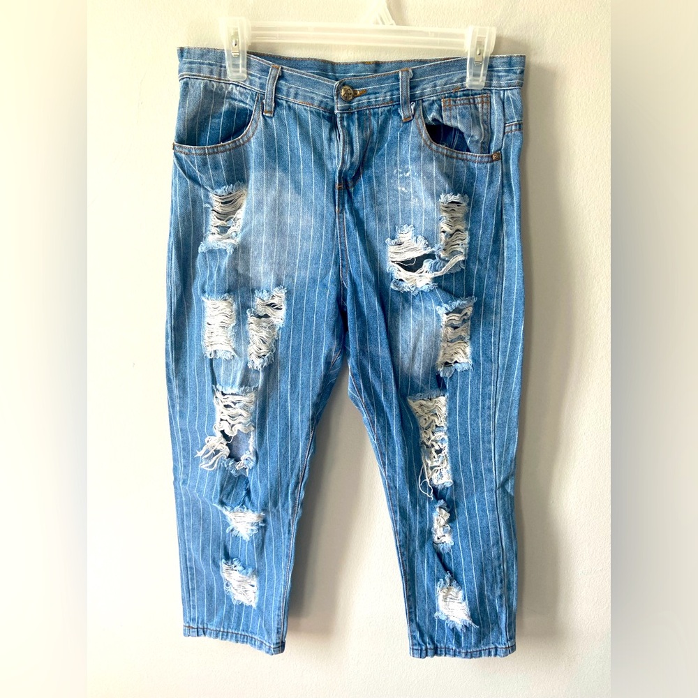 MOSCHINO TATTERED JEANS